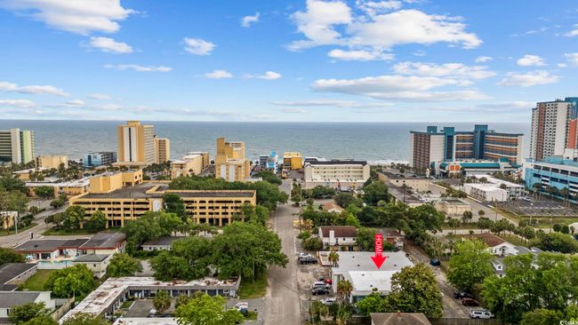 View of urban area with a nearby body of water | Image 29