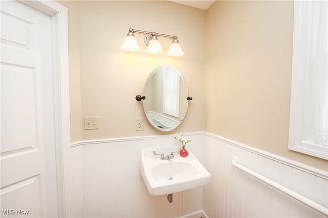 Bathroom with wainscoting and a sink | Image 18