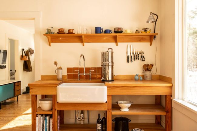 Bar featuring butcher block countertops, sink, and hardwood / wood-style flooring | Image 7