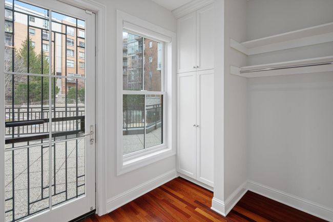 Back door to private patio overlooking the fountain courtyard | Image 20