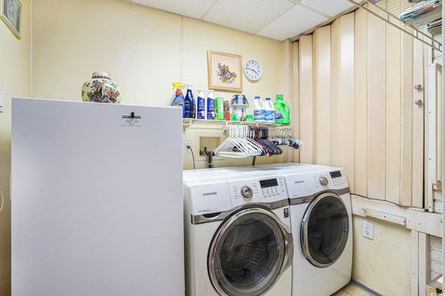 Laundry room with independent washer and dryer | Image 29