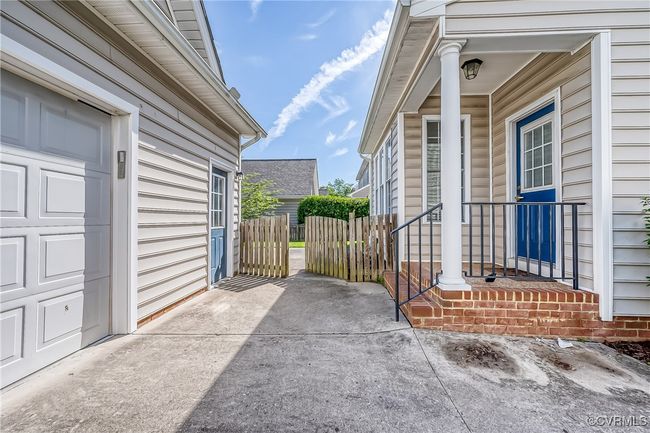 View of patio / terrace featuring a garage | Image 35
