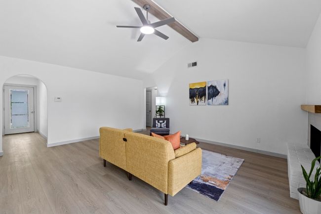 Abundant natural light. Custom ceiling beam matches the flooring. | Image 28