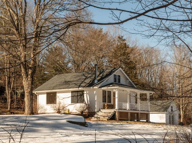 View of front of property featuring a porch | Image 26