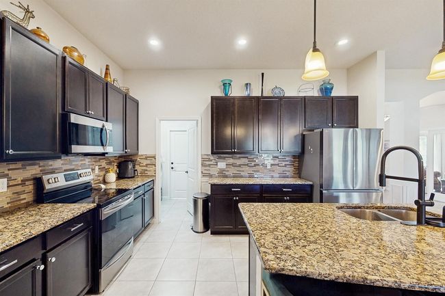 2398 Se Rich St, House other with 4 bedrooms, 3 bathrooms and null parking in Port St. Lucie FL | Image 13