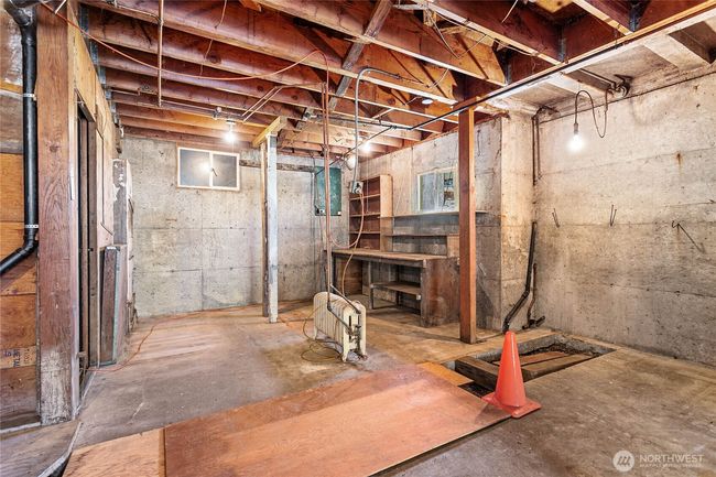 Workspace in the back, and on the left you can see a doorway which leads to what used to be a dark room. | Image 27