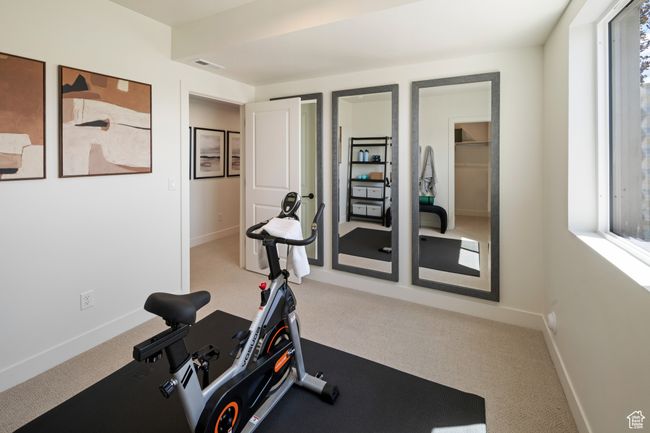 Exercise room featuring carpet and baseboards | Image 25