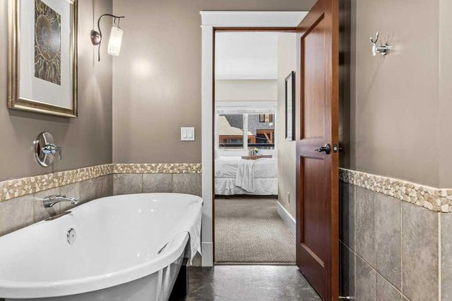 121 - 187 Kananaskis Way, Condo with 2 bedrooms, 2 bathrooms and 1 parking in Canmore AB | Image 35