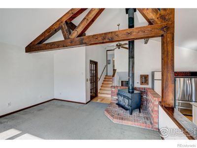 Living room with wood burning stove | Image 3