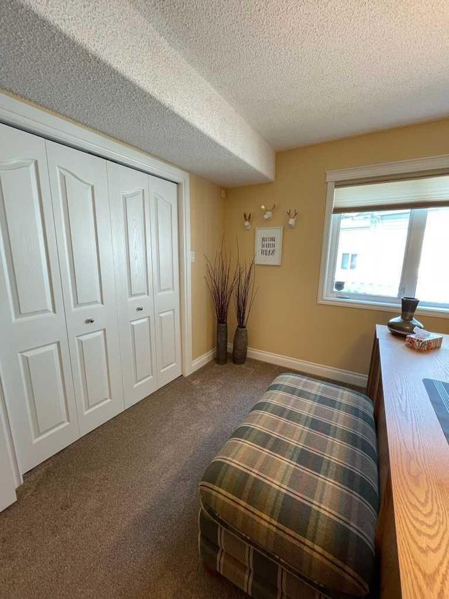 24 Evergreen Park Close W, Home with 4 bedrooms, 3 bathrooms and 5 parking in Brooks AB | Image 25