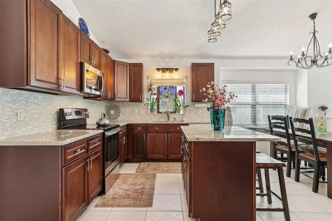 1120 Parker Canal Ct, House other with 4 bedrooms, 2 bathrooms and null parking in OVIEDO FL | Image 23