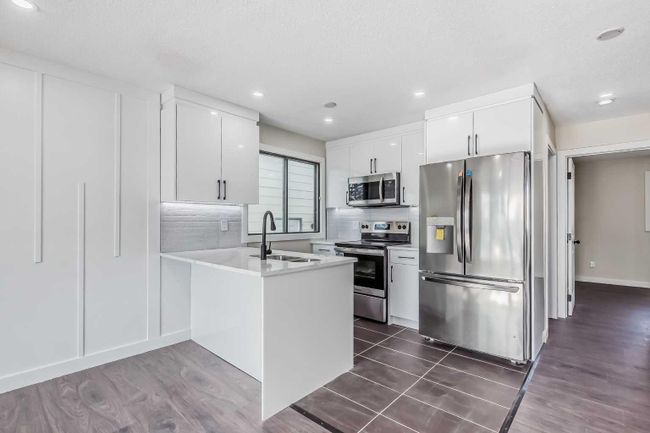 4510 44 Avenue Ne, Home with 4 bedrooms, 3 bathrooms and 2 parking in Calgary AB | Image 4