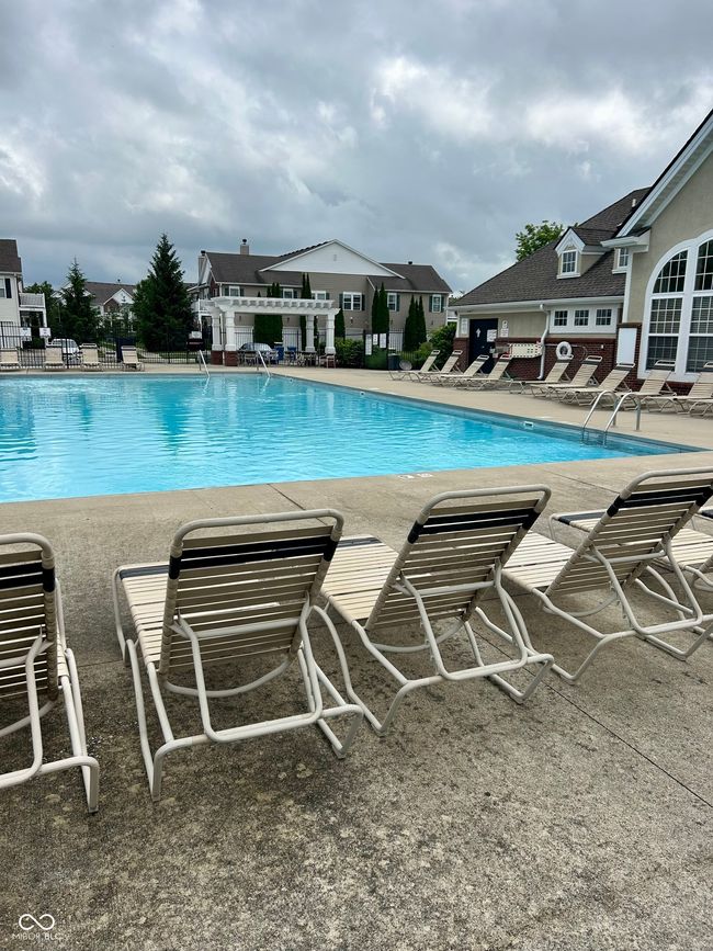 community pools with lots of seating | Image 14