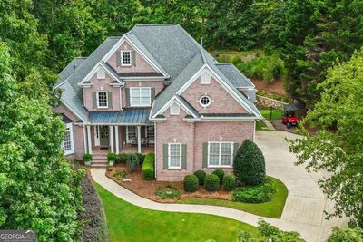 10275 Worthington Manor, House other with 4 bedrooms, 4 bathrooms and 3 parking in Suwanee GA | Image 1