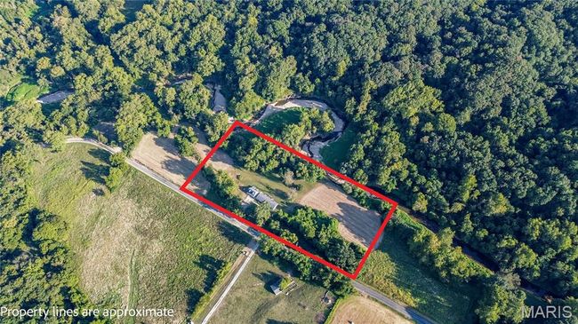 Aerial overview of property's location with property parcel outlined | Image 39