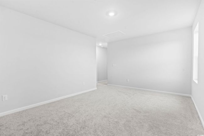 Carpeted empty room with baseboards and recessed lighting | Image 13
