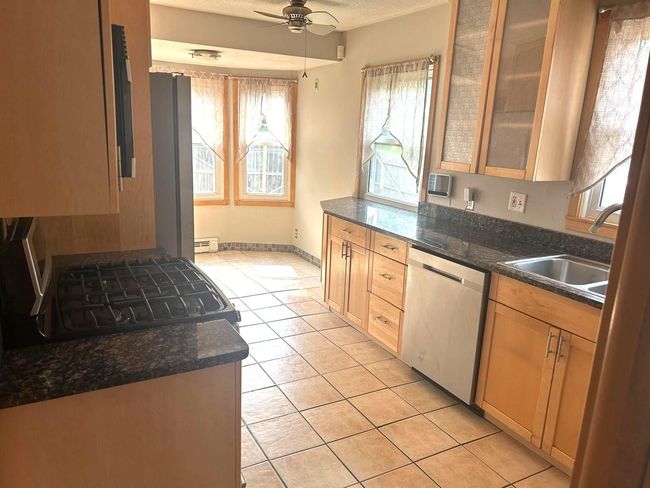 Kitchen and Bayed Dining Area | Image 9