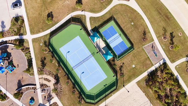Stay active with Marvida’s outdoor amenities, including tennis and pickleball courts, perfect for friendly matches or fun with family and neighbors. | Image 32