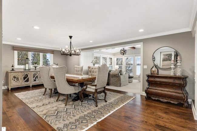 Dinning room is perfectly located between the kitchen, four season porch and family room | Image 13