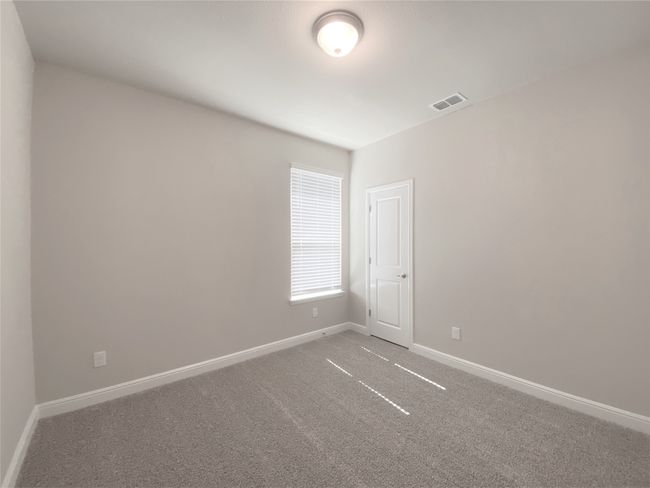 Carpeted spare room featuring baseboards | Image 9