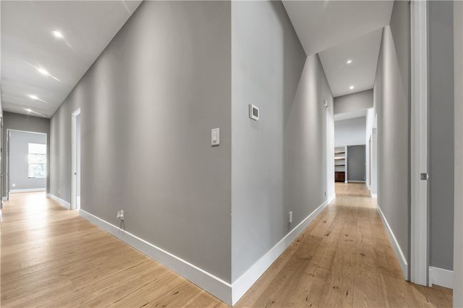 Corridor featuring light wood-style flooring and recessed lighting | Image 14