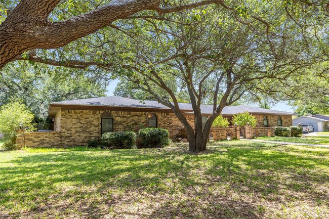 Single story brick home on a shaded corner lot | Image 4