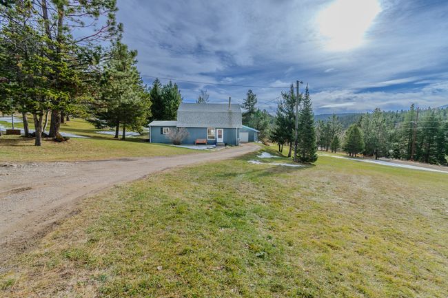View of front of property featuring a front yard | Image 72