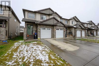 14923 103 St, Townhouse with 3 bedrooms, 3 bathrooms and 2 parking in Grande Prairie AB | Image 1