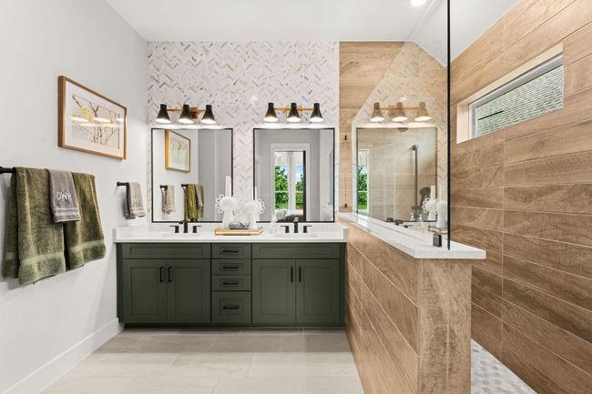 Enjoy private access to the luxurious en-suite bathroom directly from your bedroom. | Image 10