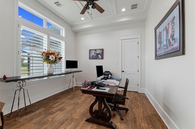 Office area with baseboards, visible vents, and wood finished floors | Image 15