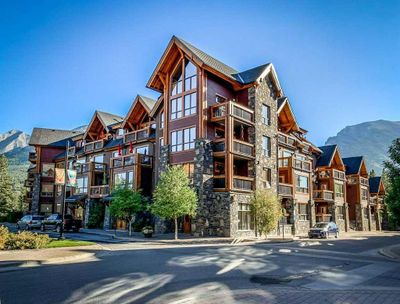 300 - 600 Spring Creek Dr, Condo with 2 bedrooms, 3 bathrooms and 72 parking in Canmore AB | Image 1