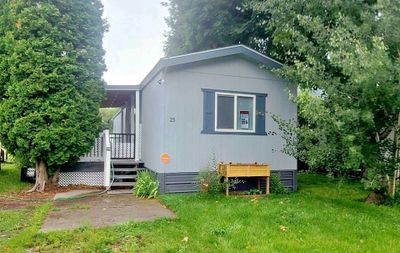 Rear view of property with a lawn | Image 3