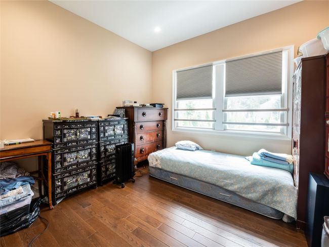 Bedroom with hardwood / wood-style floors and recessed lighting | Image 13