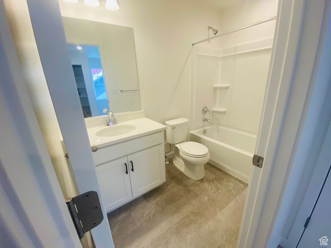 Full bathroom featuring vanity and tub / shower combination | Image 20