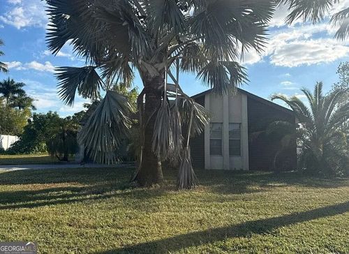 410 Parkside St, LEHIGH ACRES, FL, 33936-7026 | Card Image