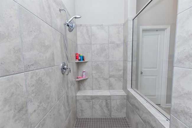 walk in shower with clean and contemporary design. | Image 20