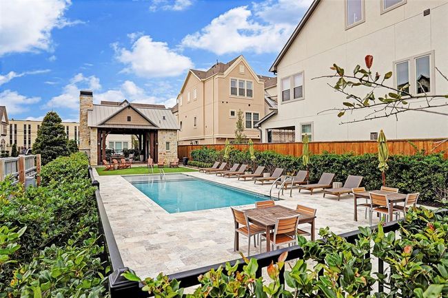 Plenty of lounge chairs to sit back and relax or enjoy a dip in the pool! | Image 39