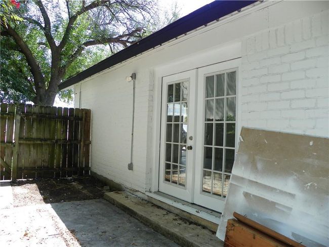 View of side of property with french doors, brick siding, and a patio | Image 20