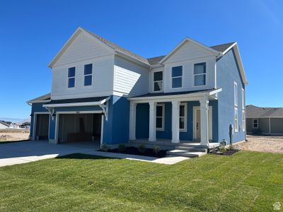 View of front of house with a front lawn and covered porch | Image 1