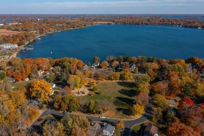 The home is located just a few blocks from Surfside beach on Cooks Bay. Watch the Mound Spirit of the Lakes fireworks next summer! | Image 2