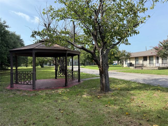 View of home's gazebo and backyard | Image 16