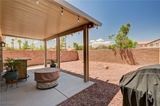 Fenced backyard featuring a patio | Image 27