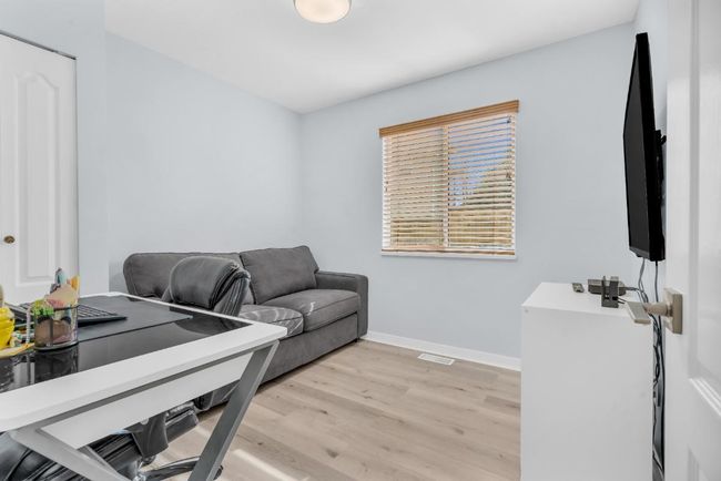 Interior space featuring baseboards and light wood-style flooring | Image 15