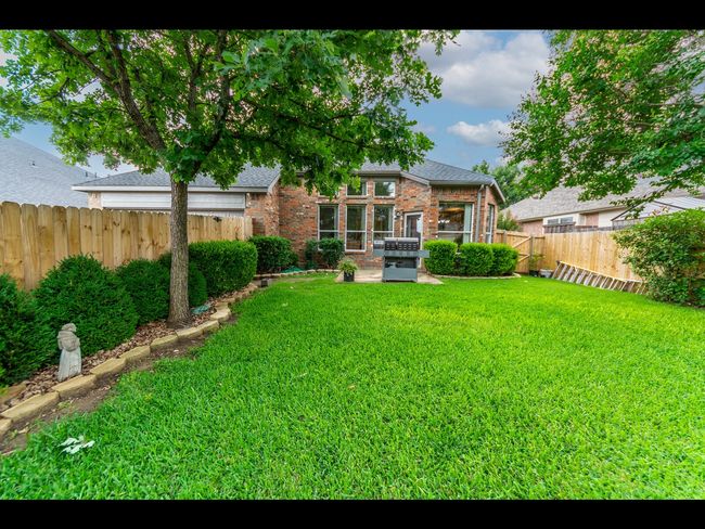 View of yard featuring a fenced backyard | Image 6
