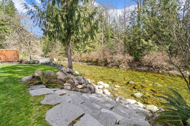 View of green lawn with a water view | Image 28