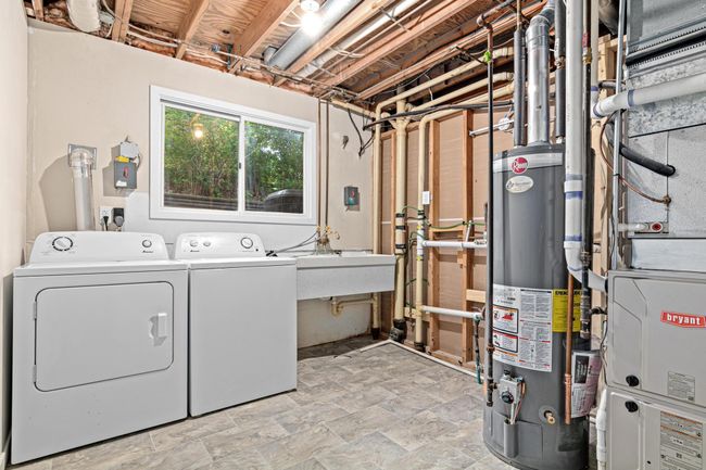 Spacious mechanical room with laundry. Newer Water Heater and Furnace. | Image 22