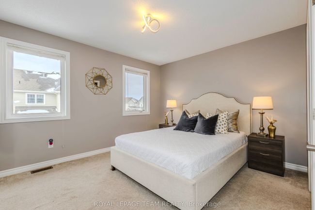 302 Song Sparrow St, House attached with 3 bedrooms, 3 bathrooms and 2 parking in Nepean ON | Image 26