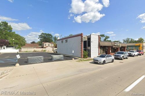1661 Fort St, Wyandotte, MI, 48192-3544 | Card Image