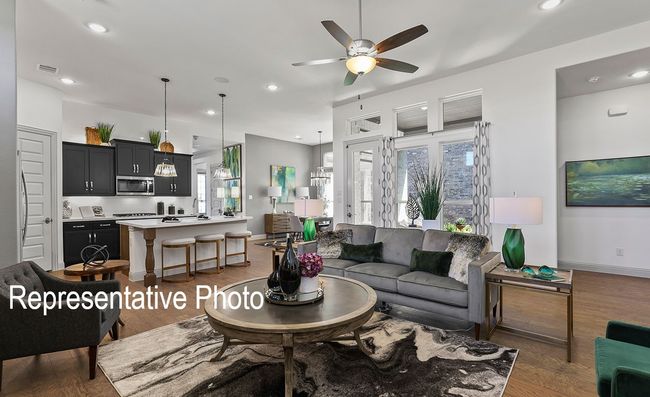 Living room featuring wood finished floors, a ceiling fan, and recessed lighting | Image 4