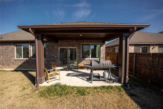 Back of house featuring a patio and a lawn | Image 27
